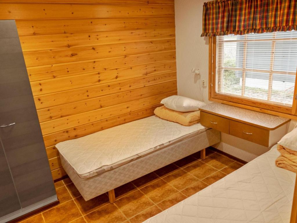 Postel nebo postele na pokoji v ubytování Holiday Home Lauri 5 by Interhome