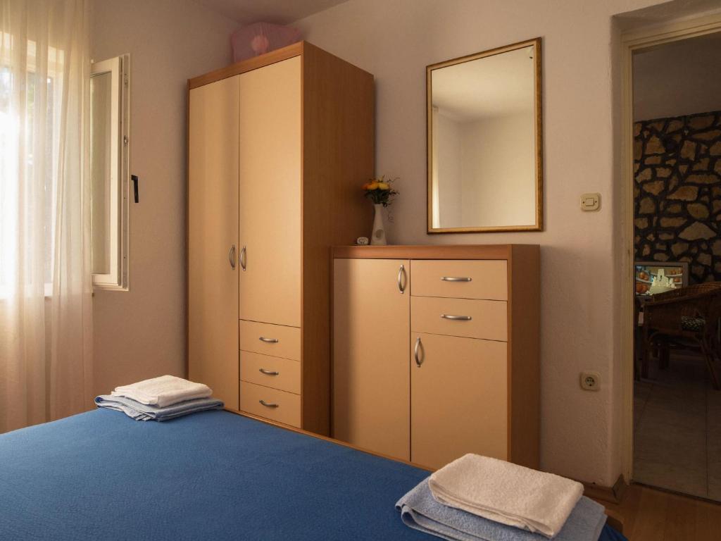 Postel nebo postele na pokoji v ubytování Holiday Home Dada by Interhome