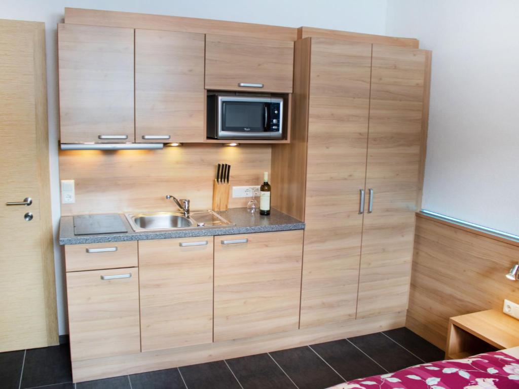 Kuchyňa alebo kuchynka v ubytovaní Apartment Bella Monte-3 by Interhome
