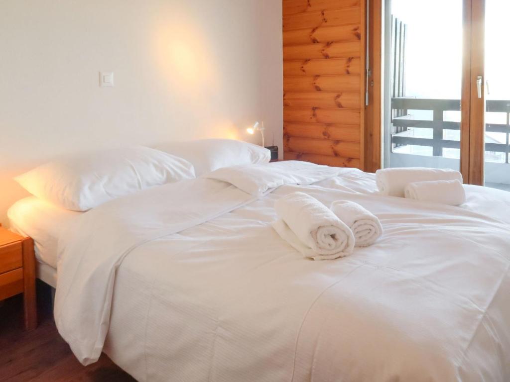 Postel nebo postele na pokoji v ubytování Apartment Hauts De Nendaz B K5 by Interhome