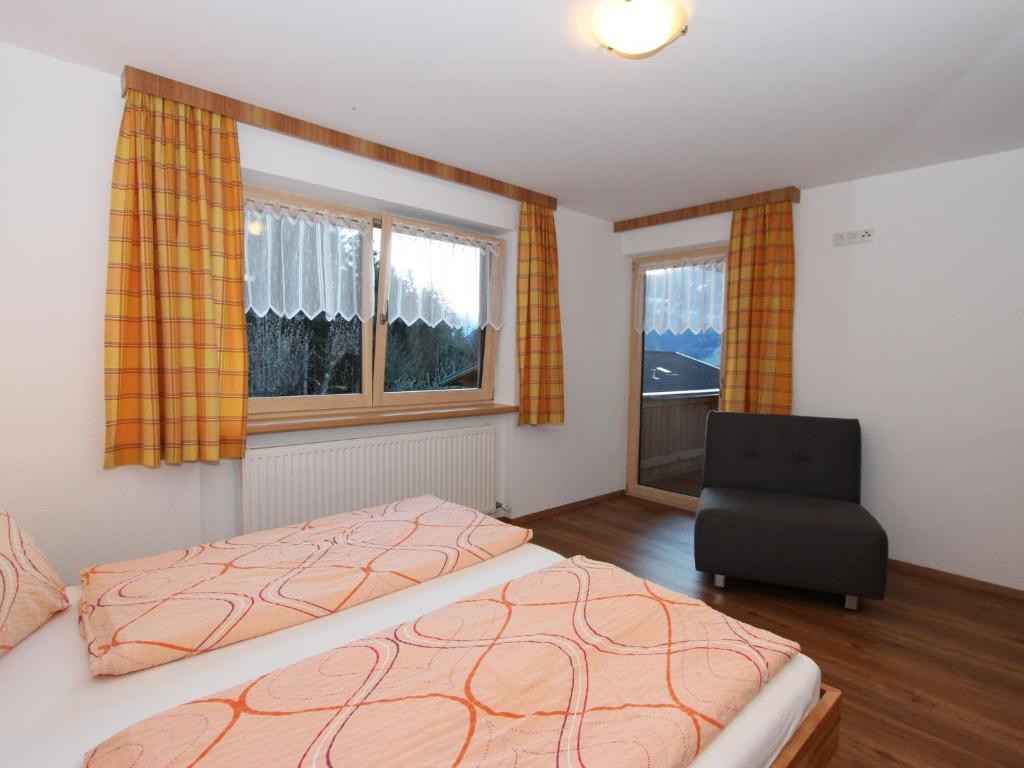 Postel nebo postele na pokoji v ubytování Holiday Home Zeller by Interhome