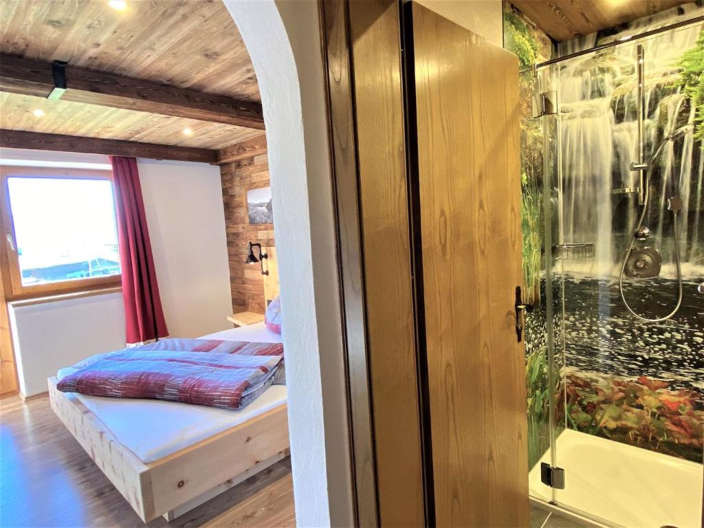Postel nebo postele na pokoji v ubytování Apartment Manuel by Interhome