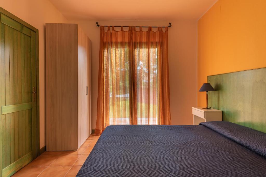 Cama o camas de una habitación en Residence I Mirti Bianchi