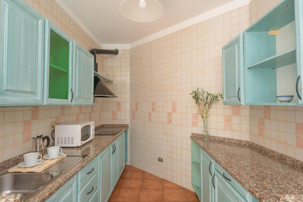 Una cocina o zona de cocina en Residence I Mirti Bianchi