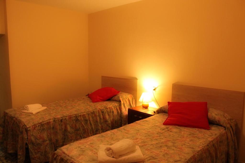 Postel nebo postele na pokoji v ubytování Apartaments Turístics Vilaró