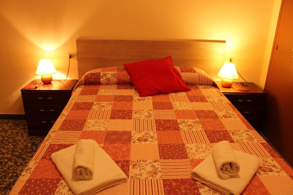 Postel nebo postele na pokoji v ubytování Apartaments Turístics Vilaró