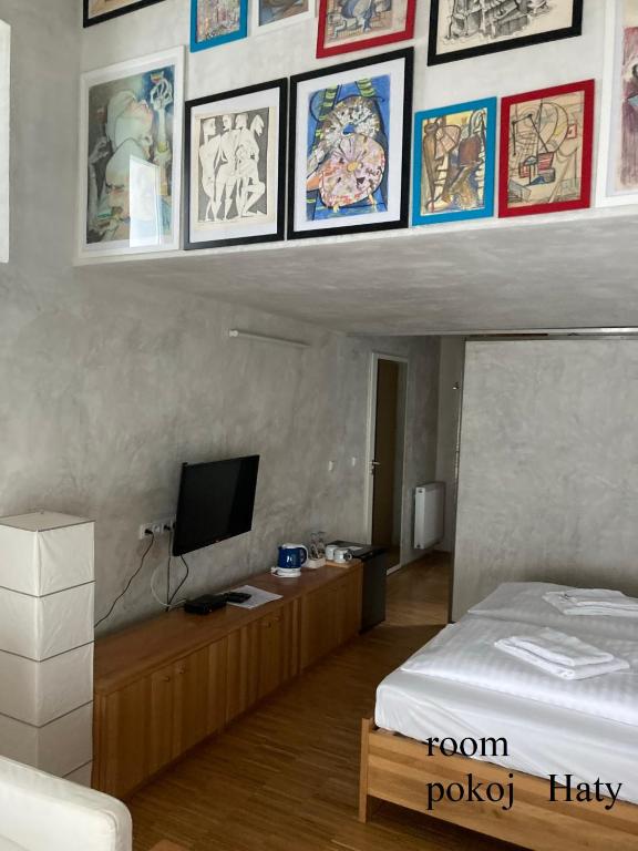 Postel nebo postele na pokoji v ubytování Besidka