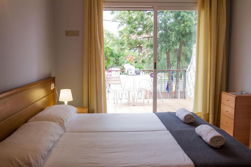 Postel nebo postele na pokoji v ubytování Hotel 139
