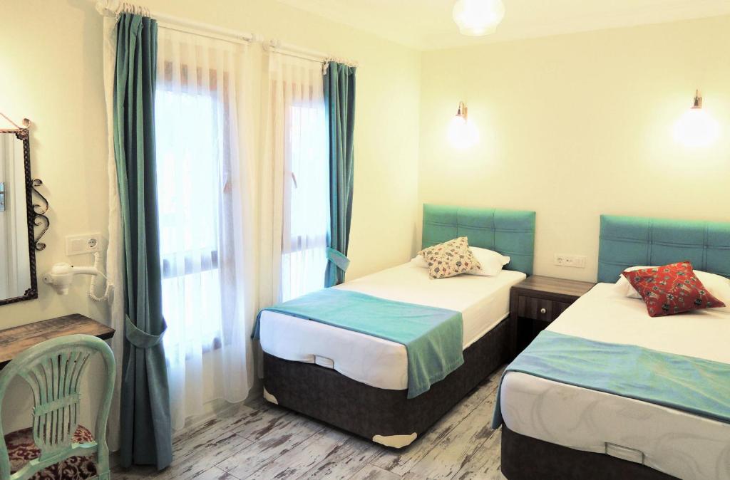Postel nebo postele na pokoji v ubytování Villa Dreams