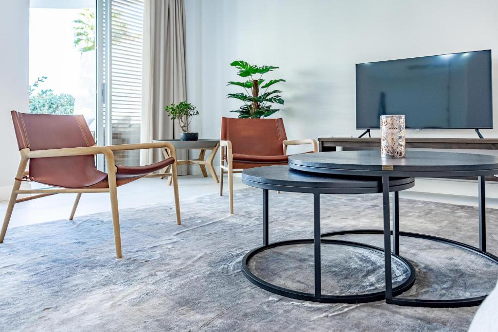 A television and/or entertainment centre at TE- Luxury resort, front line beach, families only