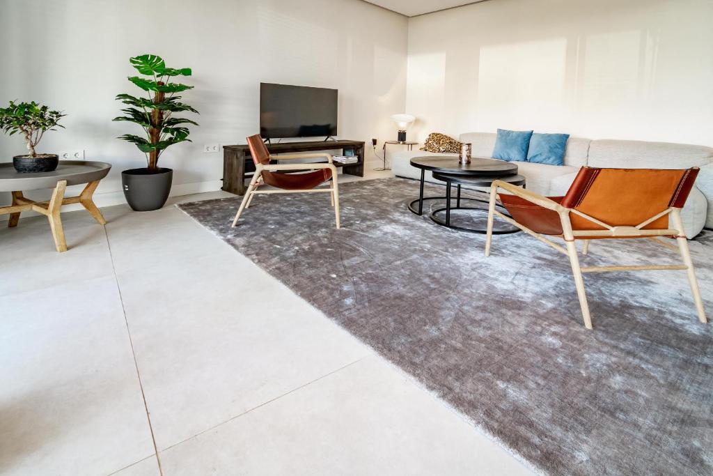 A seating area at TE- Luxury resort, front line beach, families only