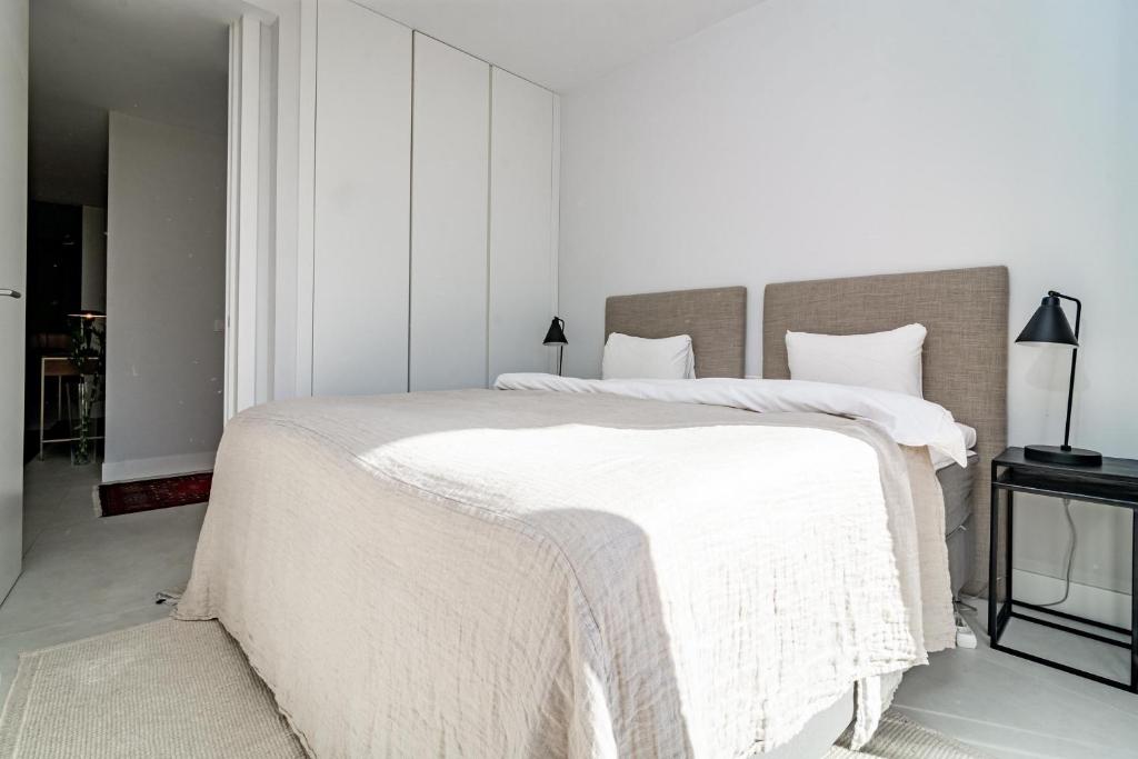 A bed or beds in a room at TE- Luxury resort, front line beach, families only