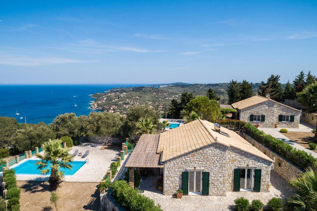 an aerial view of a house with a swimming pool at Villa Rachi in Gaios