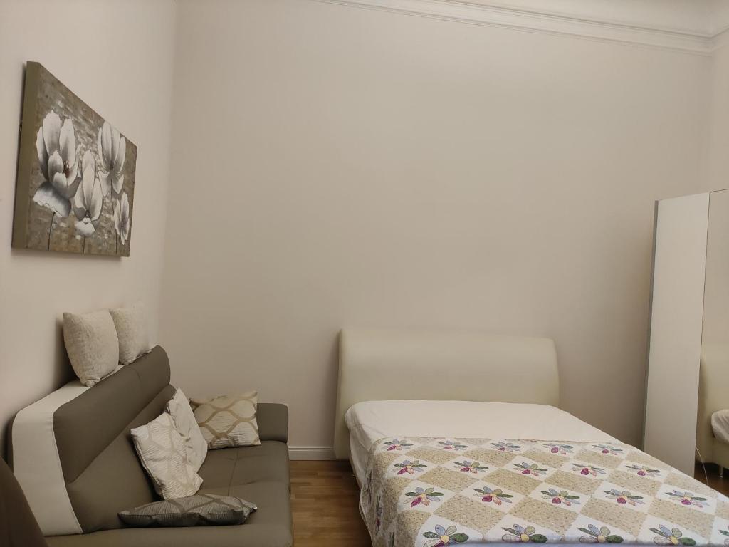 Posteľ alebo postele v izbe v ubytovaní Falk Miksa Apartment
