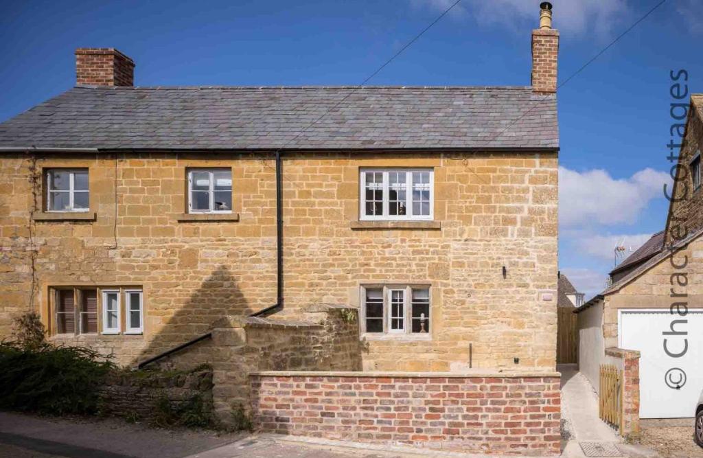 an image of a brick house at Millbank Cottage in Mickleton