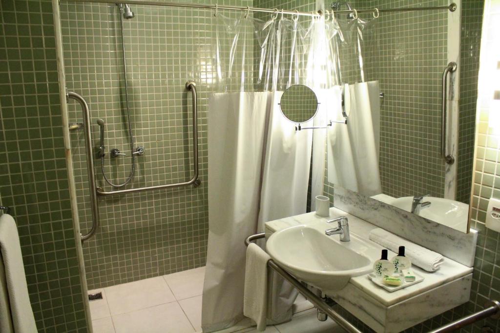 Um banheiro em eSuites Savassi Toscanini