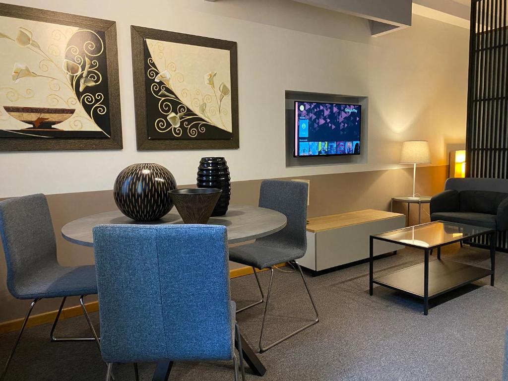 TV a/nebo společenská místnost v ubytování Domus Park Hotel & SPA