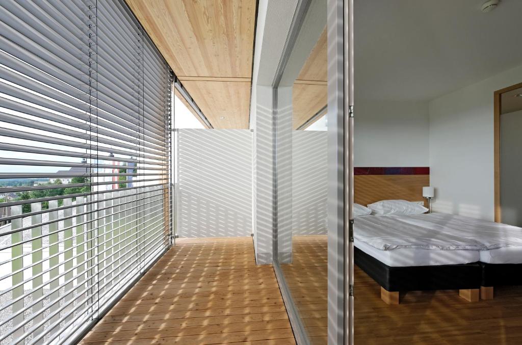 A bed or beds in a room at SPES Hotel & Seminare