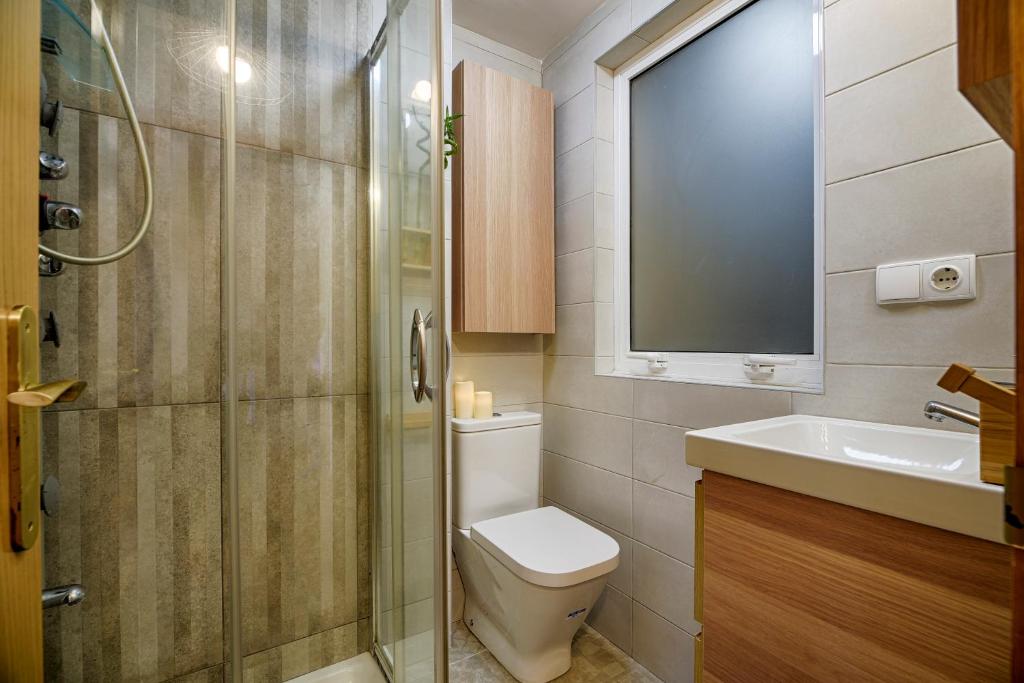 Kúpeľňa v ubytovaní San Amaro Beach 3 by TheBlueWaveApartments com