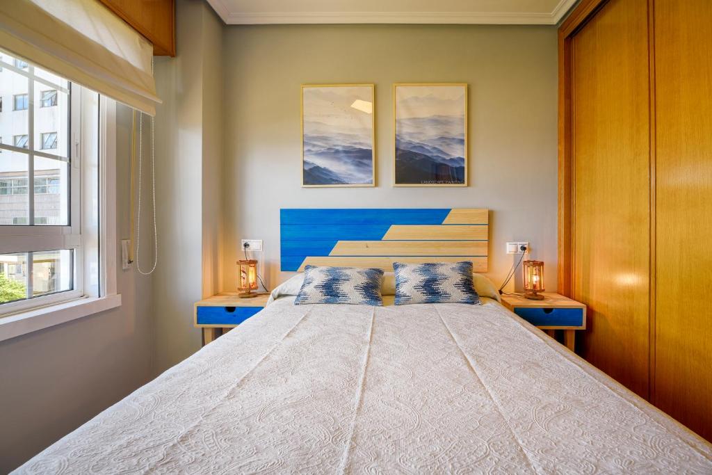 Posteľ alebo postele v izbe v ubytovaní San Amaro Beach 3 by TheBlueWaveApartments com