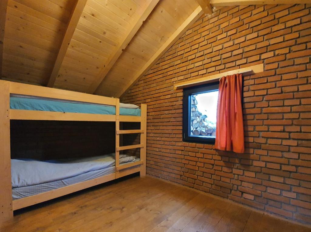 Postel nebo postele na pokoji v ubytování Lura Agroturizem