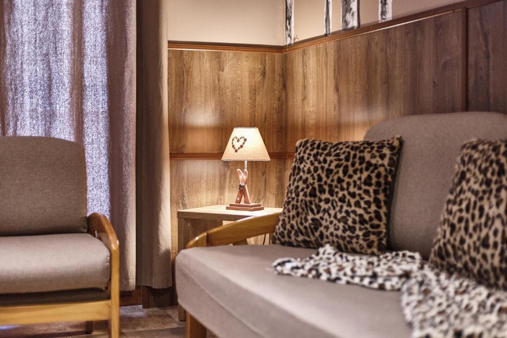 Posezení v ubytování Apartaments La Neu