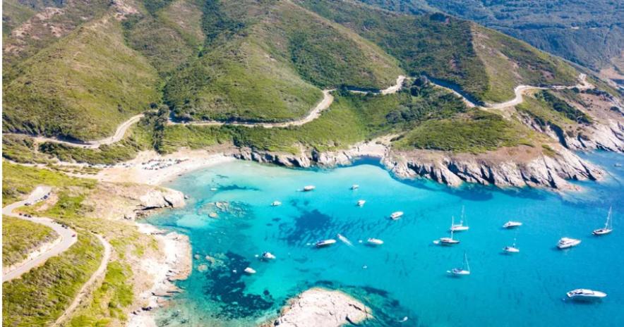 an aerial view of a bay with boats in it at AZUREO - Terrasse du golfe in Morsiglia