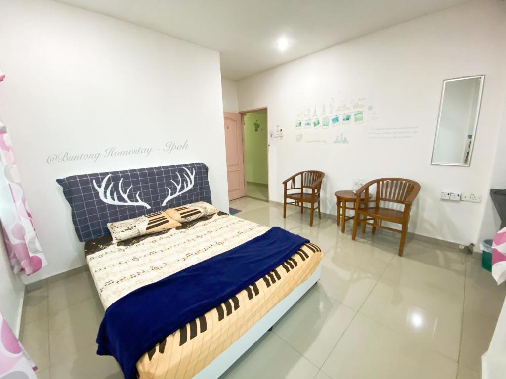 Postel nebo postele na pokoji v ubytování Buntong Homestay -Rooms Only