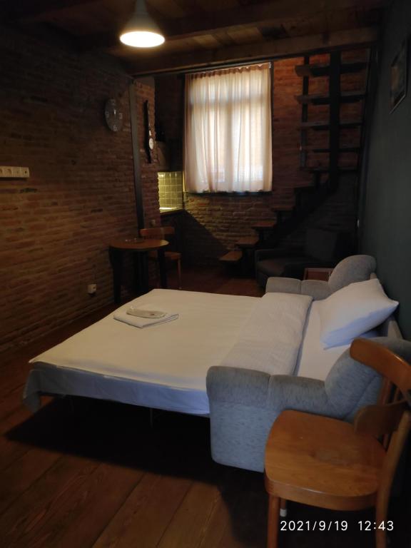 Postel nebo postele na pokoji v ubytování 3 Heritage Rooms