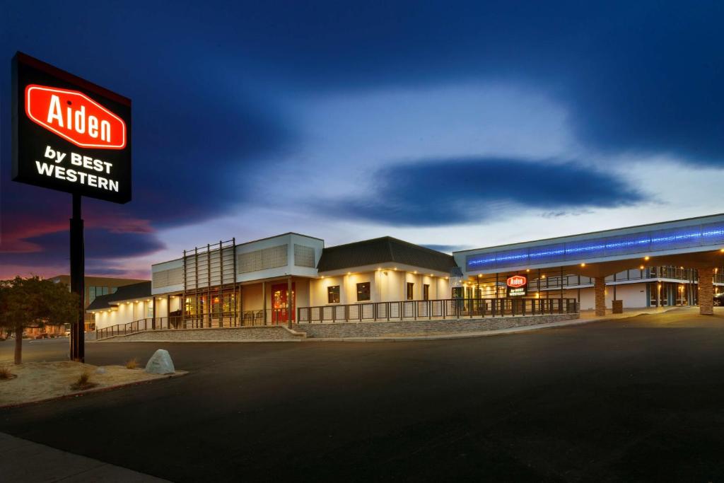 a gas station with a sign in front of it at Aiden by Best Western South Reno in Reno