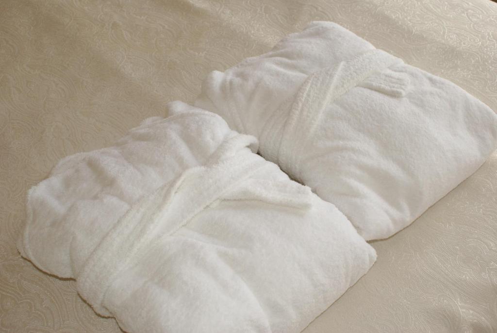 Postel nebo postele na pokoji v ubytování The Celecton Premier Kobe Sanda Hotel