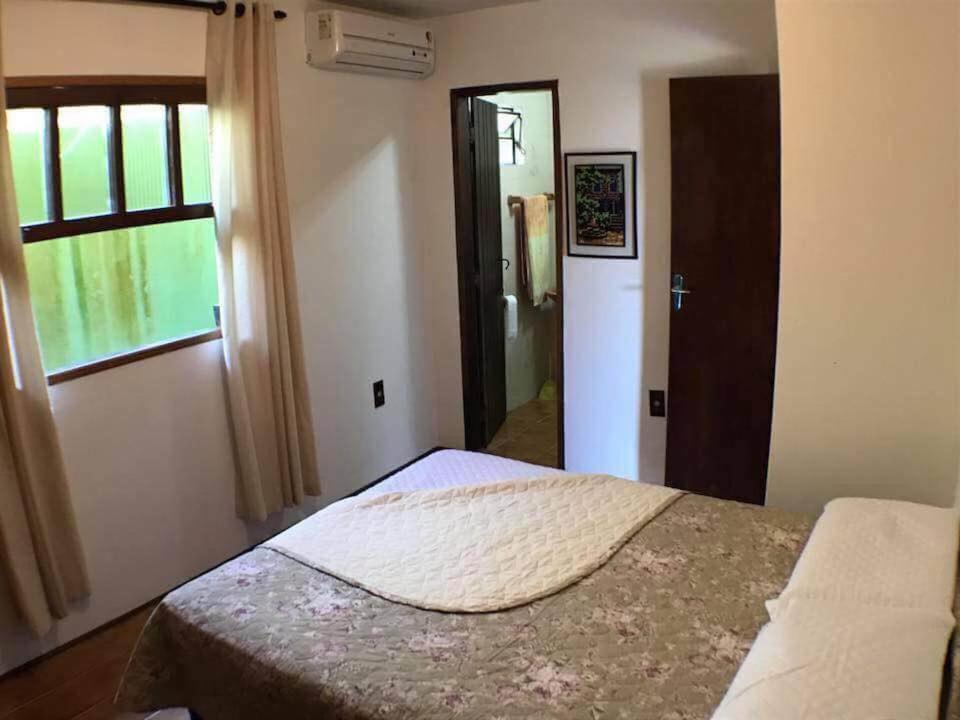 A bed or beds in a room at Casa de Praia na Praia dos Ingleses