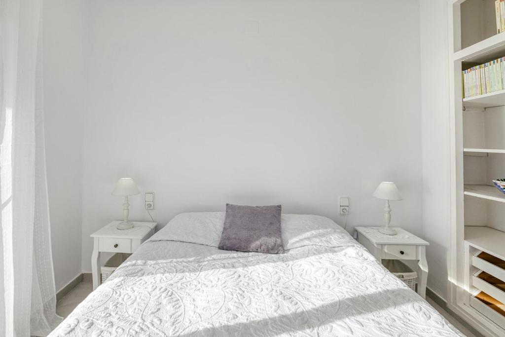 Postel nebo postele na pokoji v ubytování Apartament Roses Vista Mar
