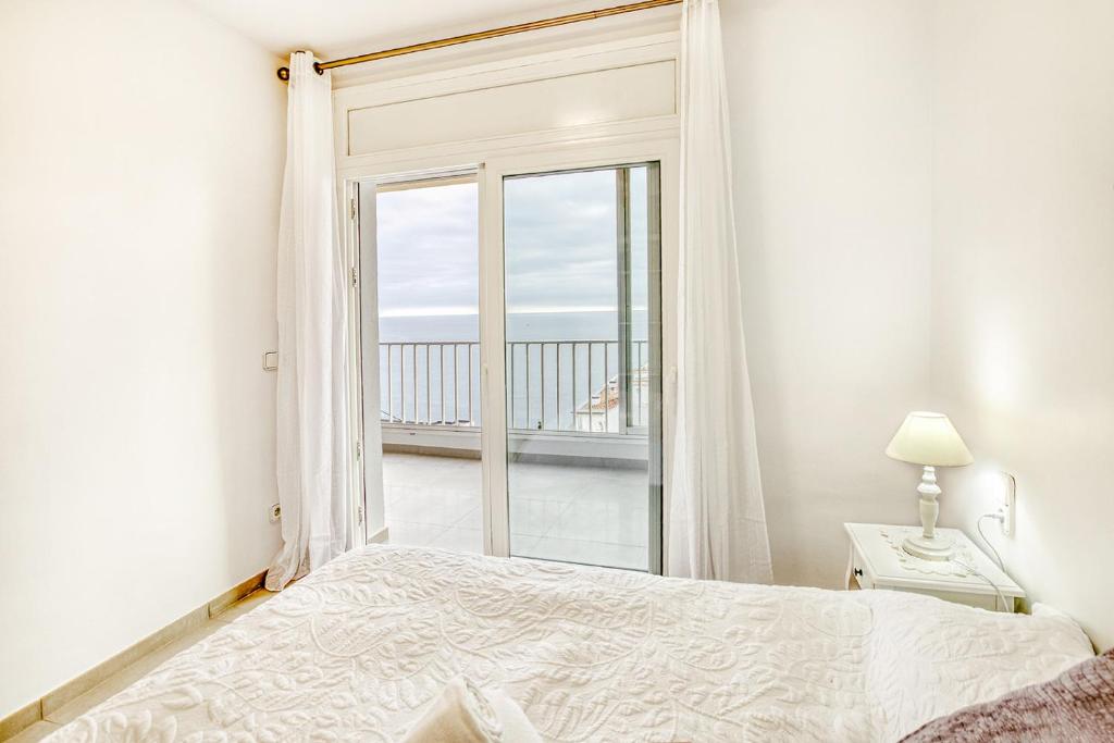 Postel nebo postele na pokoji v ubytování Apartament Roses Vista Mar