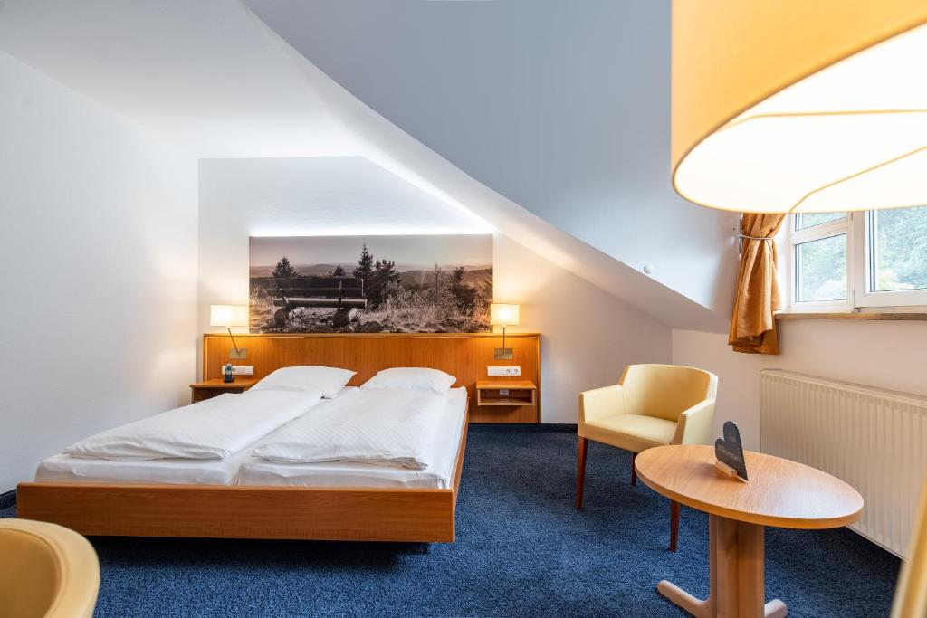 Voodi või voodid majutusasutuse Hotel-Gasthof Hüttensteinach toas
