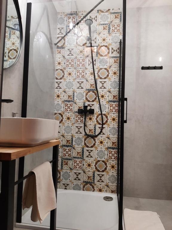 Kúpeľňa v ubytovaní Dwupiętrowy Apartament Grota 2