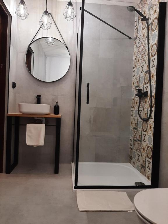 Kúpeľňa v ubytovaní Dwupiętrowy Apartament Grota 2