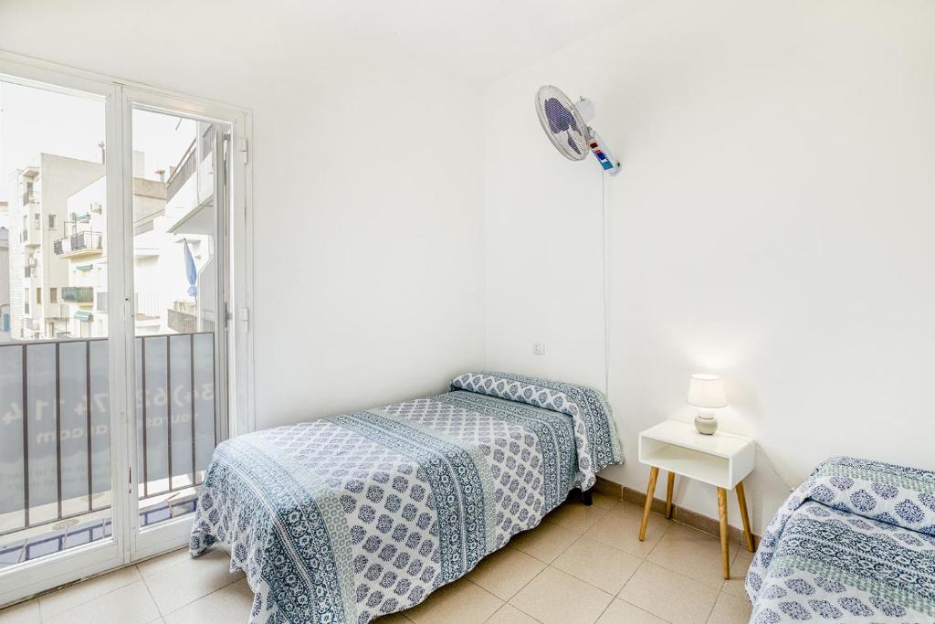 Postel nebo postele na pokoji v ubytování Apartamento Roses Playa