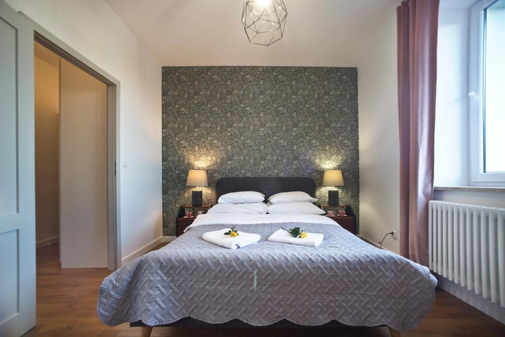 Posteľ alebo postele v izbe v ubytovaní Zoliborz P&O Serviced Apartments