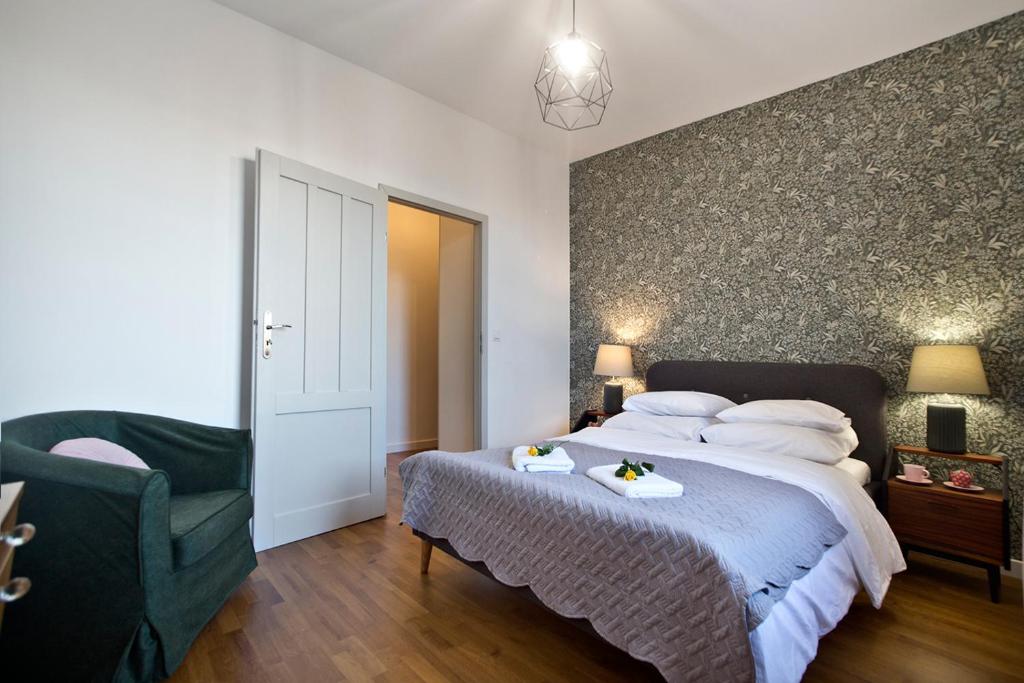 Posteľ alebo postele v izbe v ubytovaní Zoliborz P&O Serviced Apartments