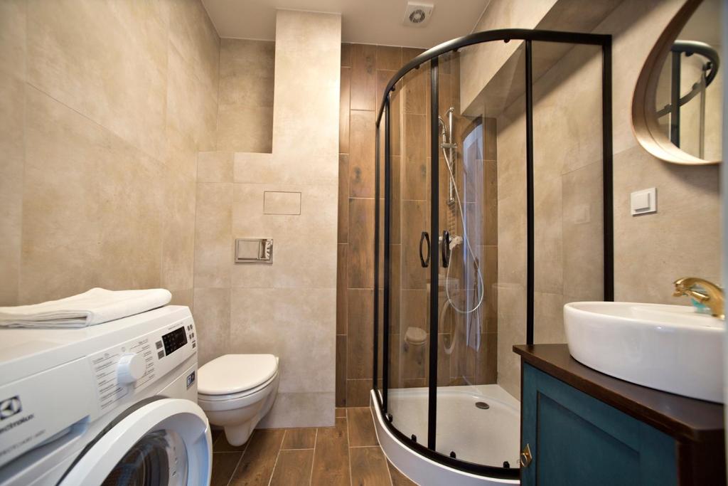 Kúpeľňa v ubytovaní Zoliborz P&O Serviced Apartments