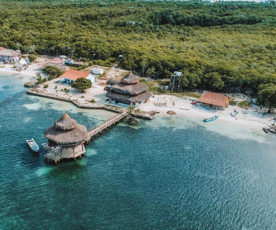 an aerial view of a resort in the water at El Embrujo Tintipan in Tintipan Island
