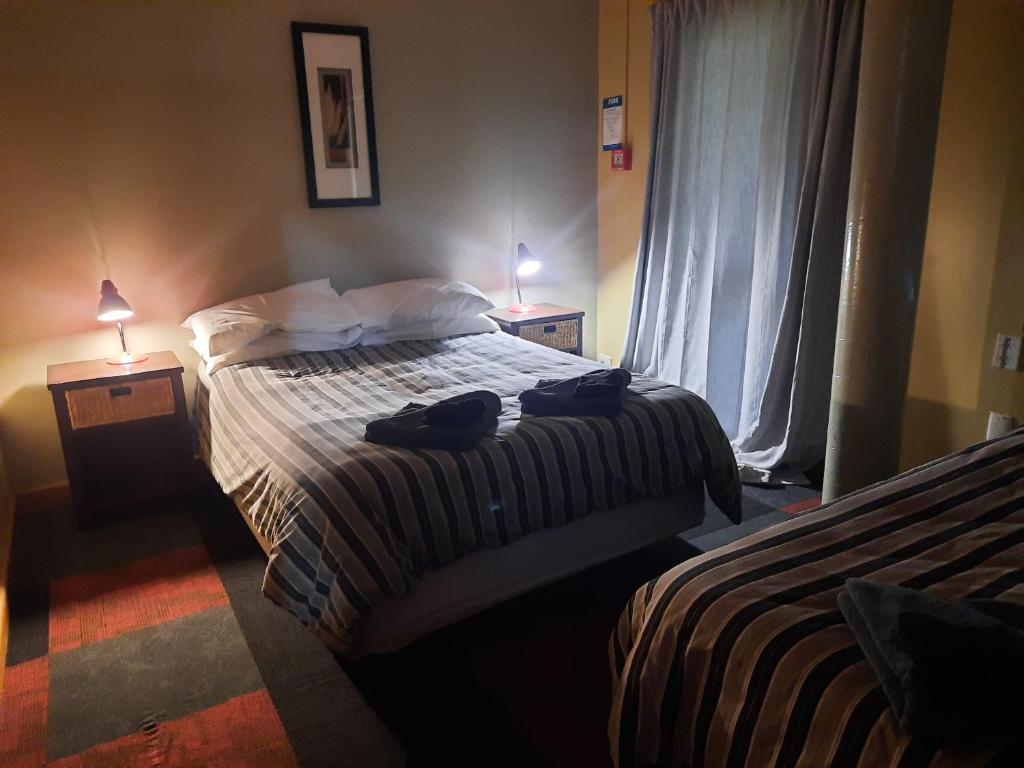 Postel nebo postele na pokoji v ubytování Mountain House