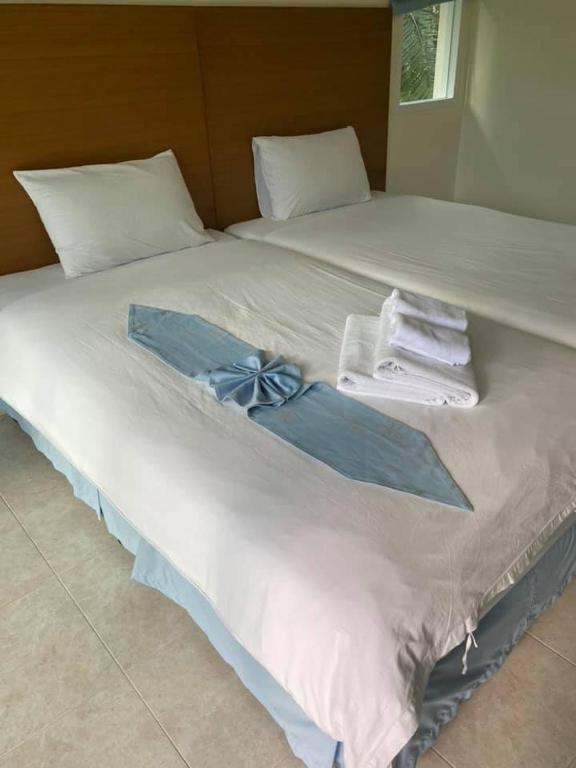 Postel nebo postele na pokoji v ubytování Vimannam Resort