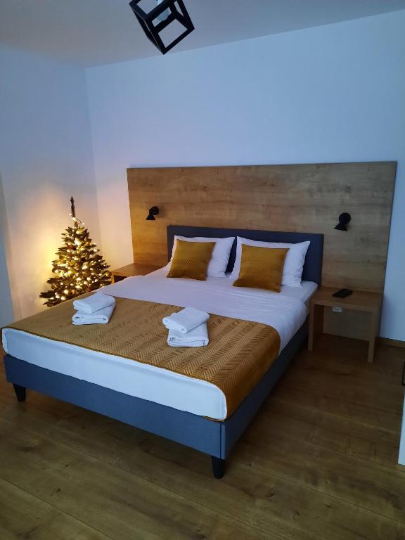 Postel nebo postele na pokoji v ubytování Apartmány Runi