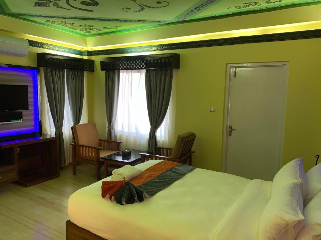 Postel nebo postele na pokoji v ubytování Hotel ABC, Boutique Hotel in Pokhara