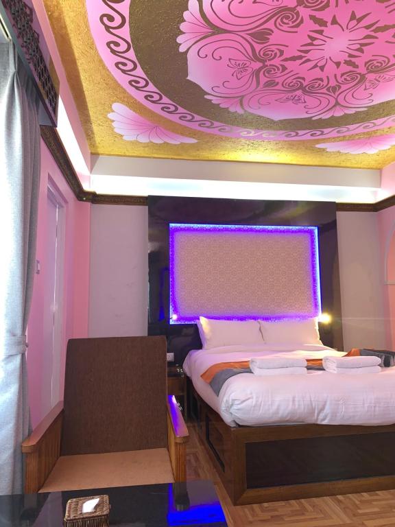 Postel nebo postele na pokoji v ubytování Hotel ABC, Boutique Hotel in Pokhara