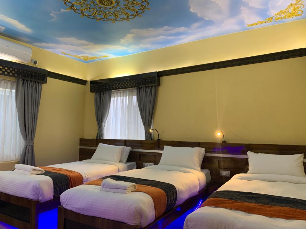 Postel nebo postele na pokoji v ubytování Hotel ABC, Boutique Hotel in Pokhara