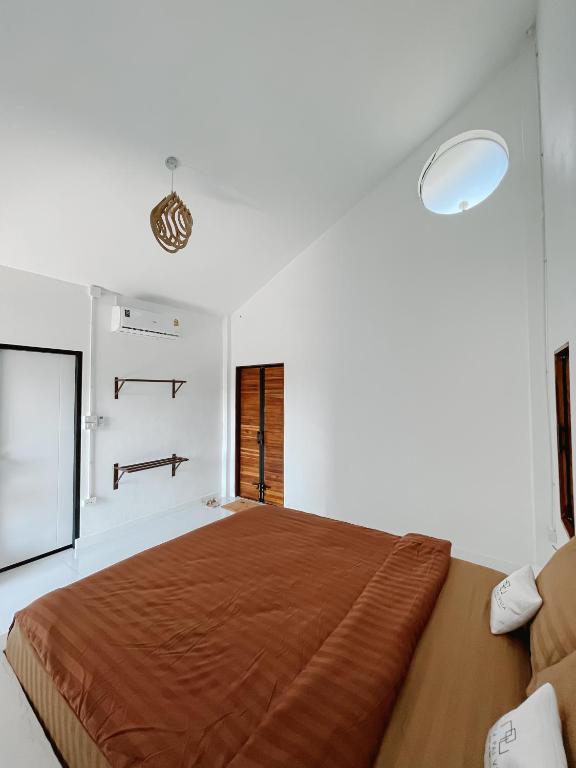 Postel nebo postele na pokoji v ubytování Aether Pai Villa