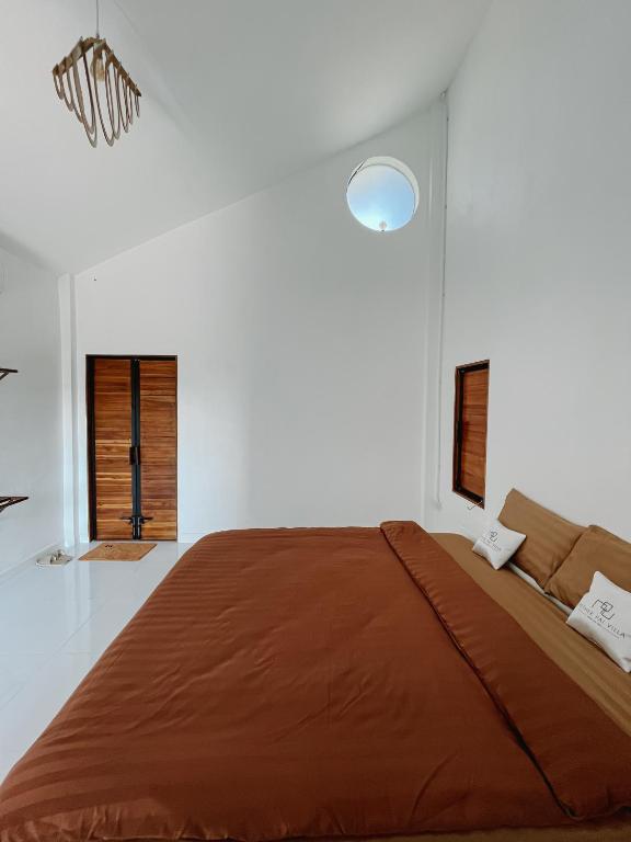 Postel nebo postele na pokoji v ubytování Aether Pai Villa
